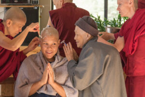Photo of Ven. Silananda (Christina Manriquez) preparing to take anagarika precepts at Sravasti Abbey, Washington State, USA, in July 2017.