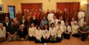 Photo of gathered bhikkhunis, bhikkhus, and lay supporters at the Dalhikamma (reordination ceremony) of Venerable Silananda in Port Townsend, Washington, USA, on November 21, 2025.