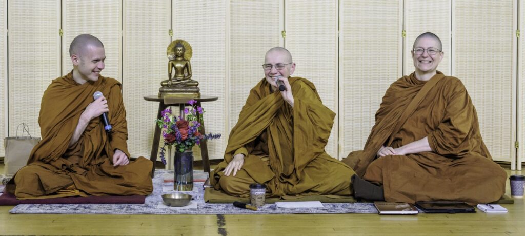 Photo of Ayya Suvijjana at Clear Mountain Monastery in Seattle, Washington, with Ajahn Nisabho (left) and Ayya Niyyanika (right).